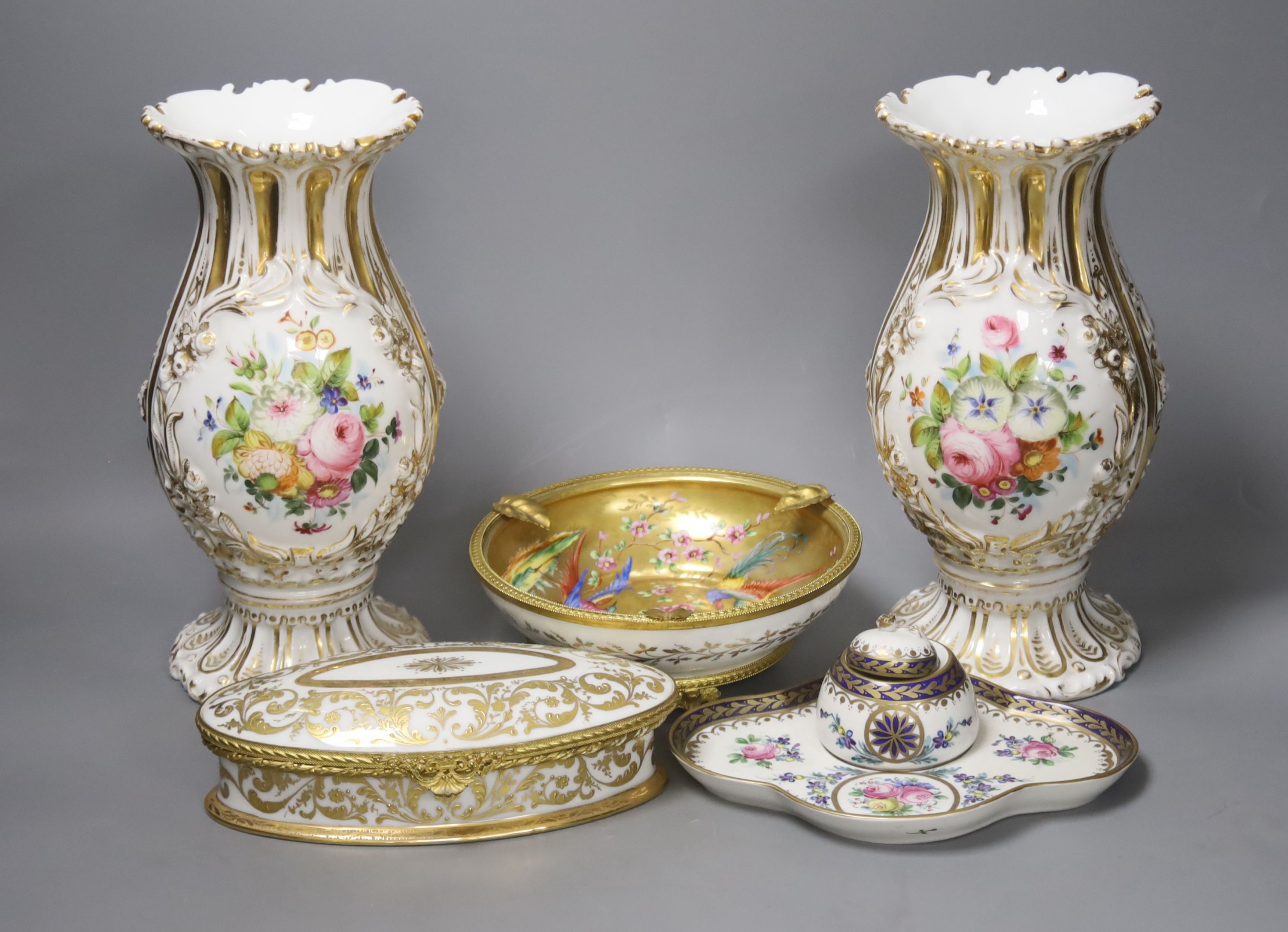 A Paris porcelain box and cover, c.1890, a pair Paris porcelain vases, a similar ‘fantastic birds’ bowl and a Dresden inkwell and height 25cm